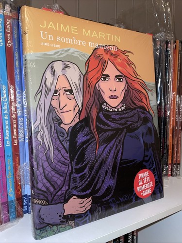 Sombre manteau jaime - un,