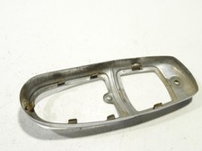 Enjoliveur de feu arriere