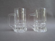 2 chopes à bière en verre 25