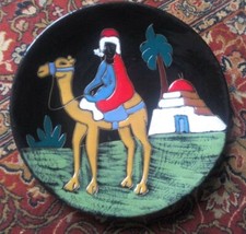 Joli plat rond en terre cuite