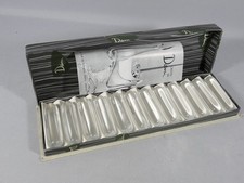 Daum 12 porte couteaux en cristal, vers 1960