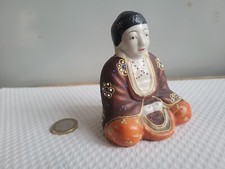 Statue de bouddha porcelaine