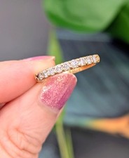 Bague demie alliance en or sertie de 9 diamants d'environ 0,36ct au total Or 75