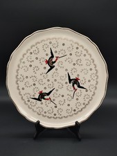 Grand plat à gâteau Longwy faïence – modèle Chypre – décor cigognes