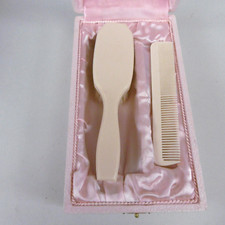 ancienne brosse et peigne bakelite ? ivoirine