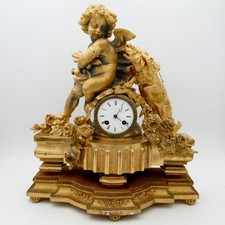 Grande pendule « L'Amour et la Fidélité », en régule doré, fin XIXe siècle.