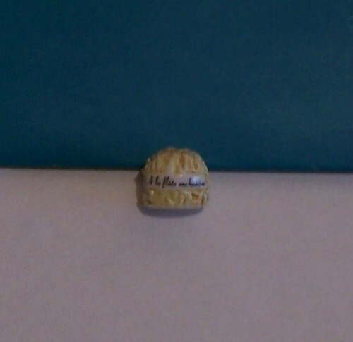 Fève publicitaire gâteau - , a