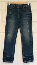 Jean bleu vieilli garçon Tu