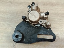 UN ETRIER DE FREIN ARRIERE NISSIN MOTO HONDA 125 CBR 2004 2005 2006