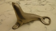 Ancien vintage  Décapsuleur En Forme De Phoque acier métal argenté bottle opener