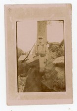 PHOTO snaphot, un militaire en uniforme fusil cartouchière