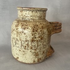 Pot à cerises avec repose