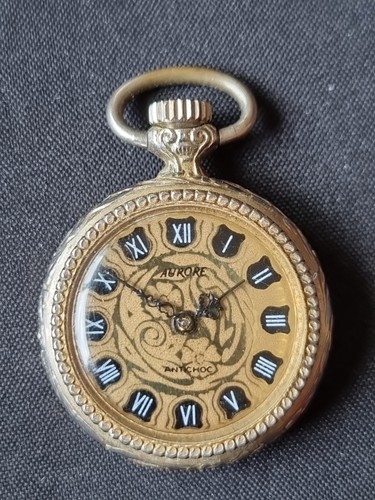 Montre col mécanique - de,