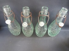 Lot de 4 bouteilles anciennes