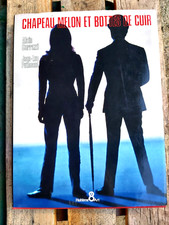 Chapeau melon et botte de cuir