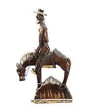 Wood Quijote riding his horse