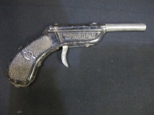 Pistolet jouet en tôle