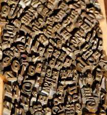 Lot de caractères à dorer police matériel de reliure dorure cuir bronze/laiton´