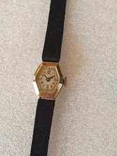 Petite montre  en Or et argent -