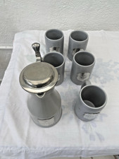Service à bière en faience