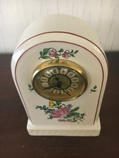 1 horloge en faïence de