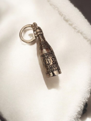 Porte clés ancien - ancien, bière