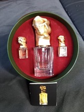 coffret eau du soir Sisley flacon vide + mignonnettes