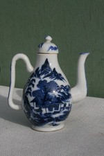 verseuse aiguière en porcelaine bleu et blanc de chine.