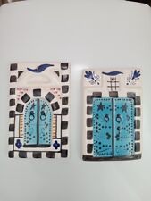 Lot de deux carreaux portes