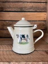 Jolie théière en tôle