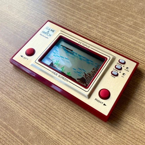 Superbe game watch - &, +