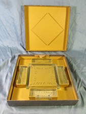 Ensemble en cristal: Dessous de plat ,2 dessous de bouteille, 12 porte couteaux