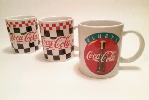 Lot coca cola mugs in - 3,
