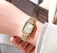 Montre dorée pour femme - , en