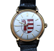 Montre homme 1960 mécanique Canton du Jura Suisse Rare plaqué or et acier