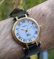 Montre Mixte Burberry - Dress Watch - cadran romain - pile neuve - très bel état