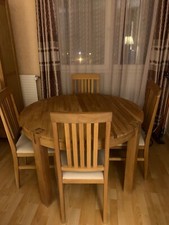 table extensible en chêne avec 4 chaises 