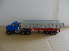 Camion semi-remorque benne