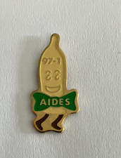 65 - Pin's PRESERVATIF - SIDA AIDES 97-1