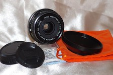 Objectif PK 28mm f2,8 SMC PENTAX M, avec bouchons, pare-soleil et housse, TBE