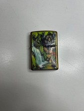 Briquet en métal animal cascade vert or d'occasion