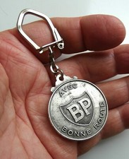 Ancien porte clé BP British Petroleum Station Garage Auto Ecriture Arabe.