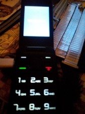 Téléphone à clapet noir Alcatel. État de fonctionnement. Pièce de musée