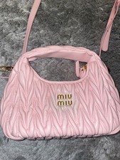 Sac Miu Miu rose avec lance 