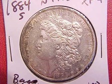 1884 S MORGAN DOLLAR - BAG