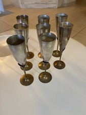 8 flutes à champagne métal argenté et laiton doré
