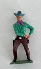 STARLUX / WESTERN COW BOY  SORTANT UN  REVOLVER