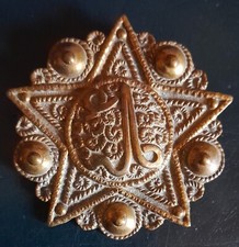 Ancienne broche, écriture