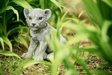 Statuette en pierre lion