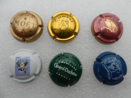 Lot capsules plaques de - 4,